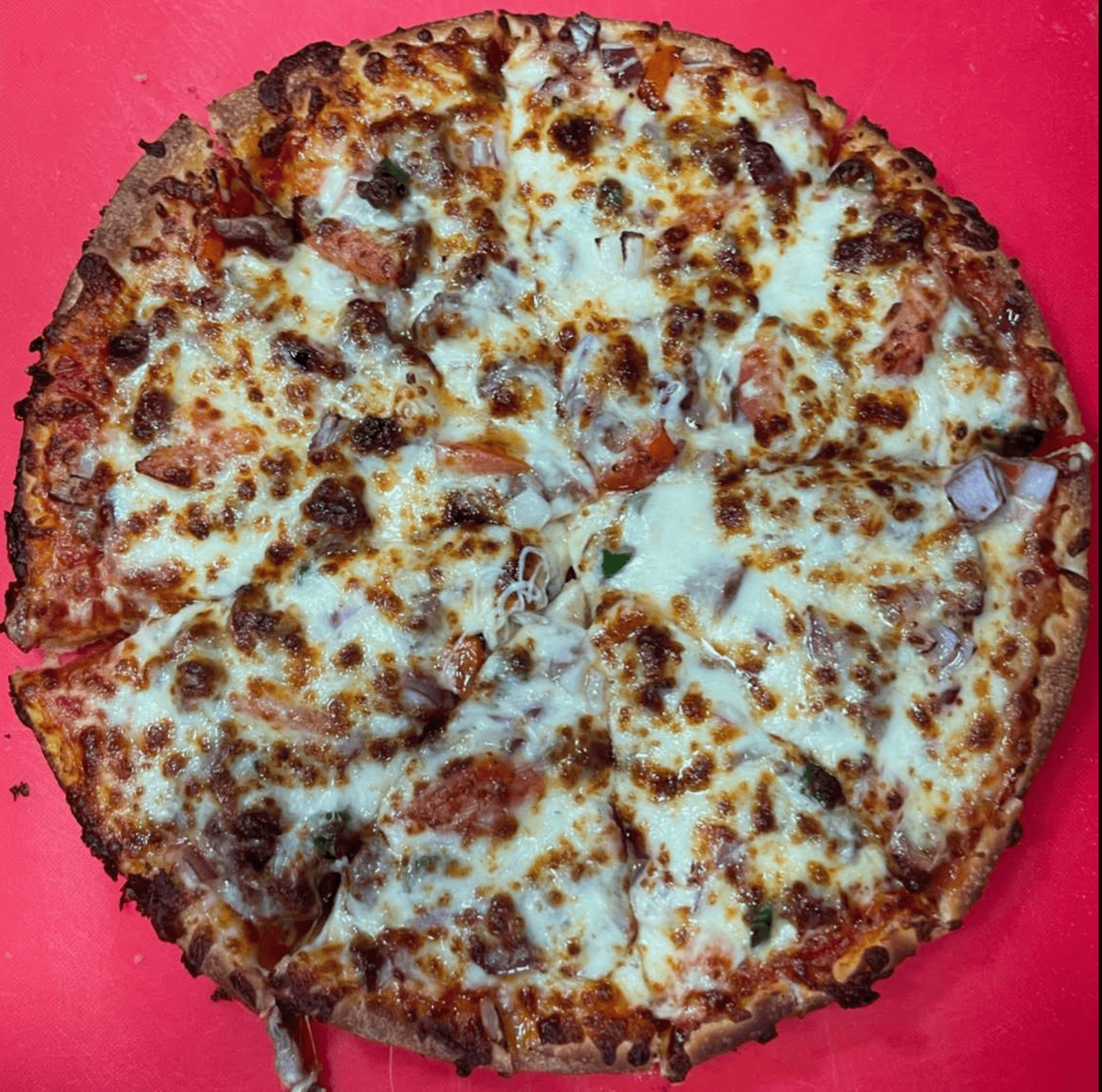 delicious hot pizza with fresh ingredients and golden crust Marmaris Kebab House Oban