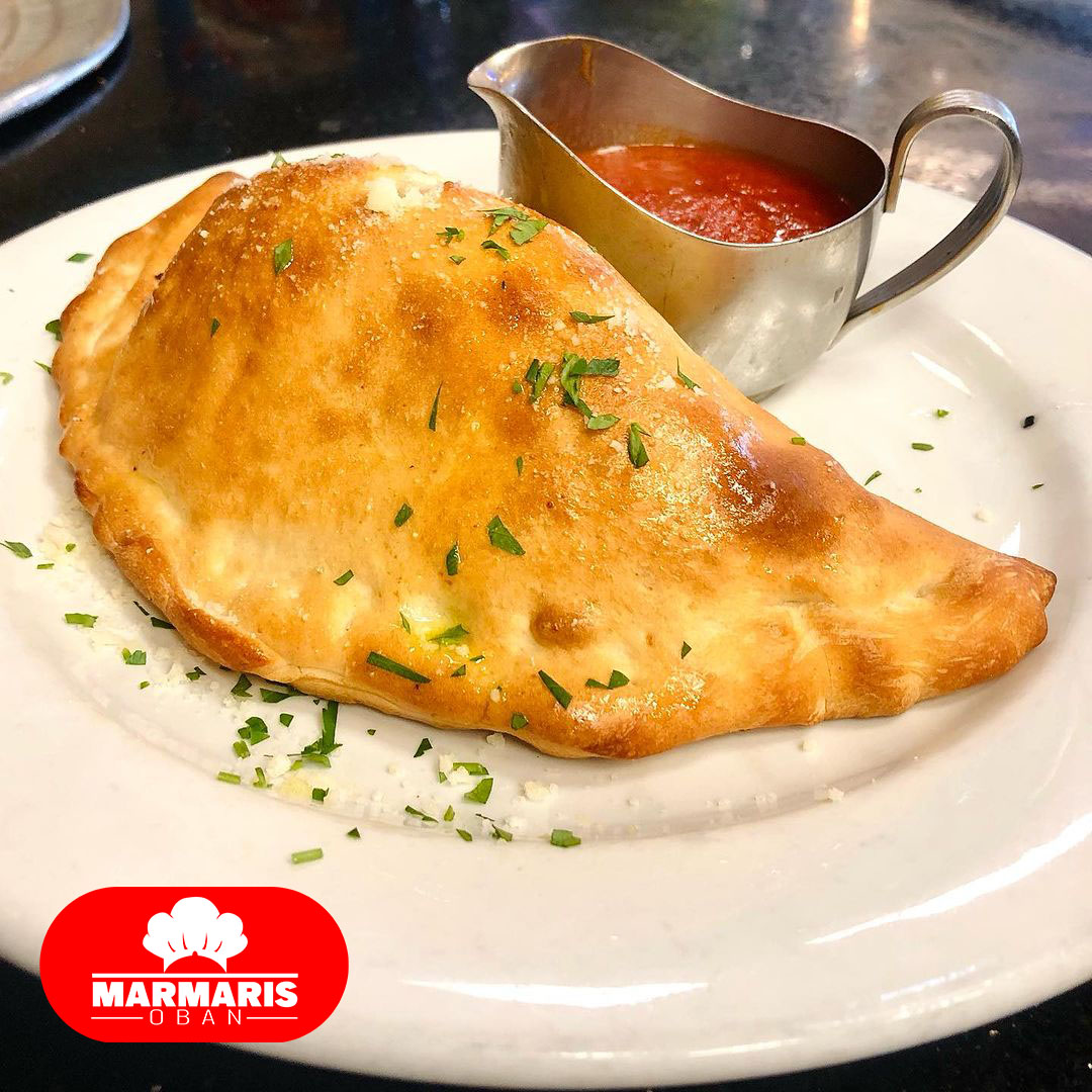 stuffed calzone with melted cheese and fresh vegetables Marmaris Kebab House Oban